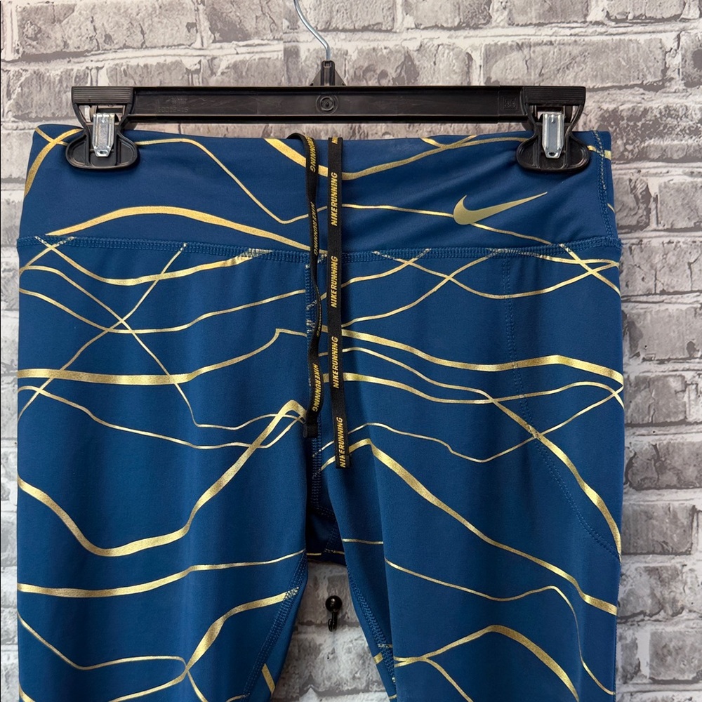 Nike running leggings with Blue and‎ Gold Design